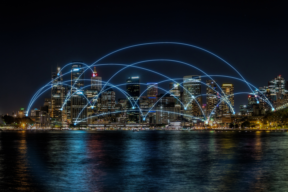 network and connection technology concept in vivid futuristic city, modern cityscape connect to global communication and worldwide business module